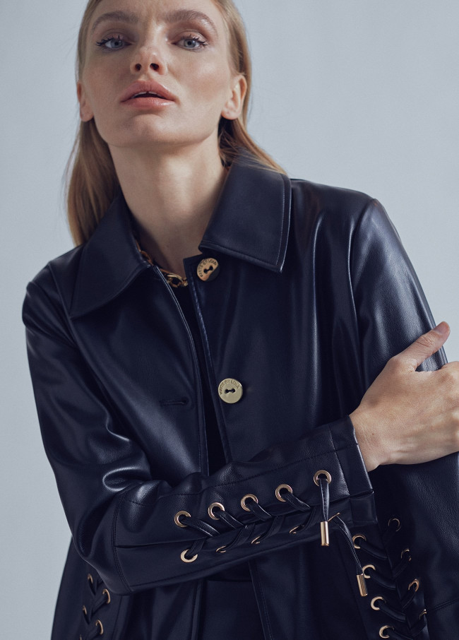 Leather jacket with eyelet details
