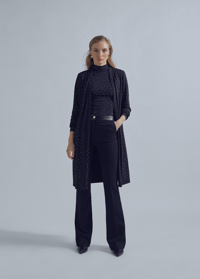 Flared trousers with leather detail