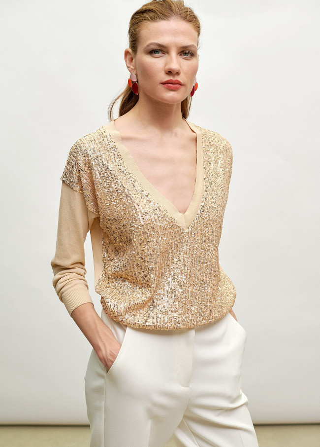 V-neck sweater with gold sequins