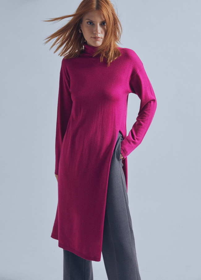 Long sweater with a high collar and slit
