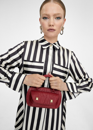 Mini crossbody bag with engraved logo