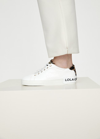Zapatillas tipo sneakers detalles animal print
