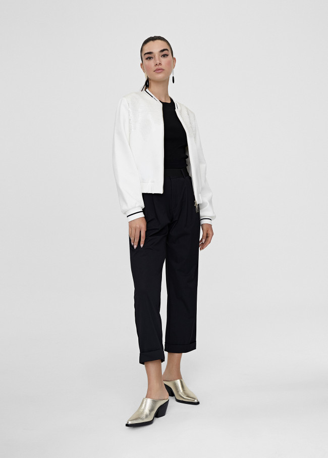 Cropped trousers with turn-up hems