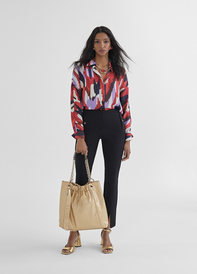 Calças skinny com abertura