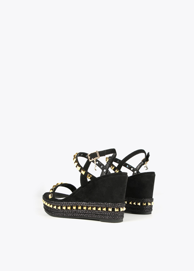 Black wedge sandals with golden studs