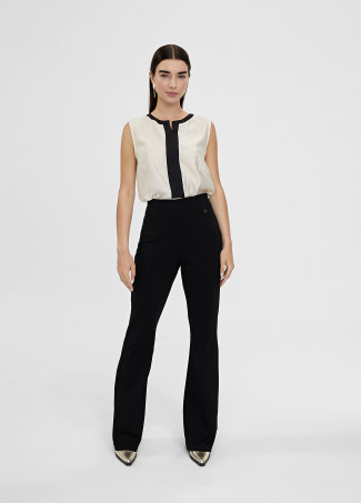 Top bicolor con aberturas