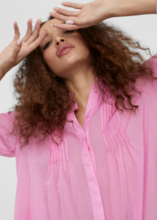 Blouse longue fendue