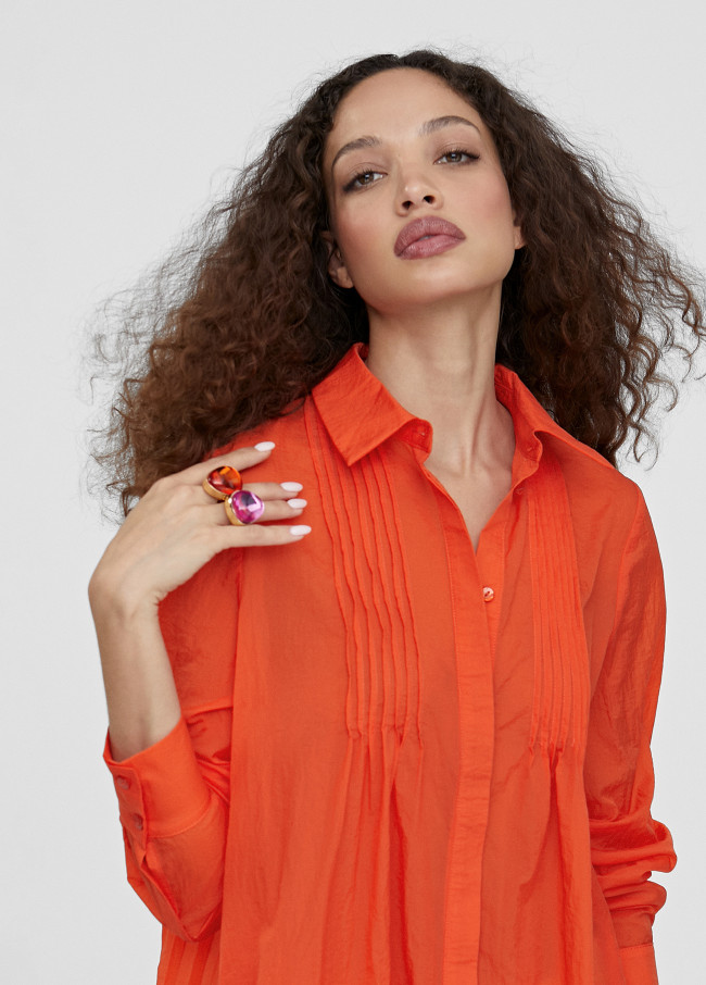 Blouse longue fendue