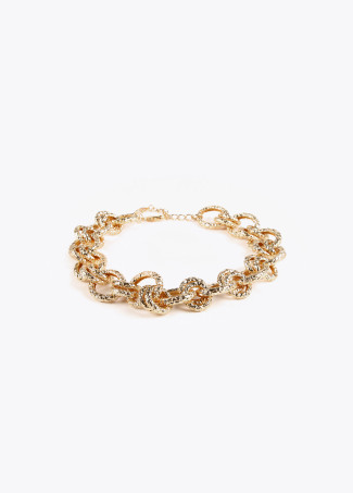 Collar gargantilla dorada con textura