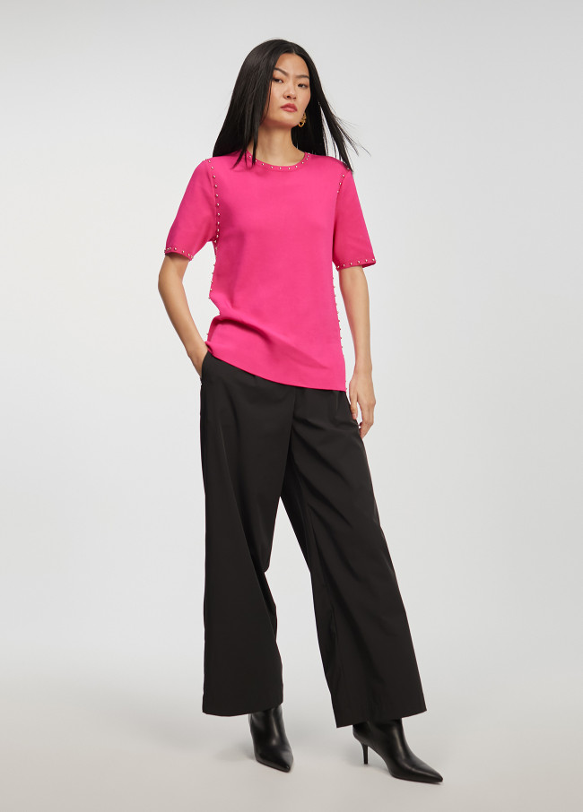 Pullover in maglia borchie