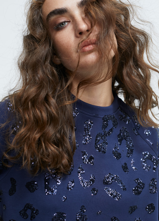 Dress with sequinned detail