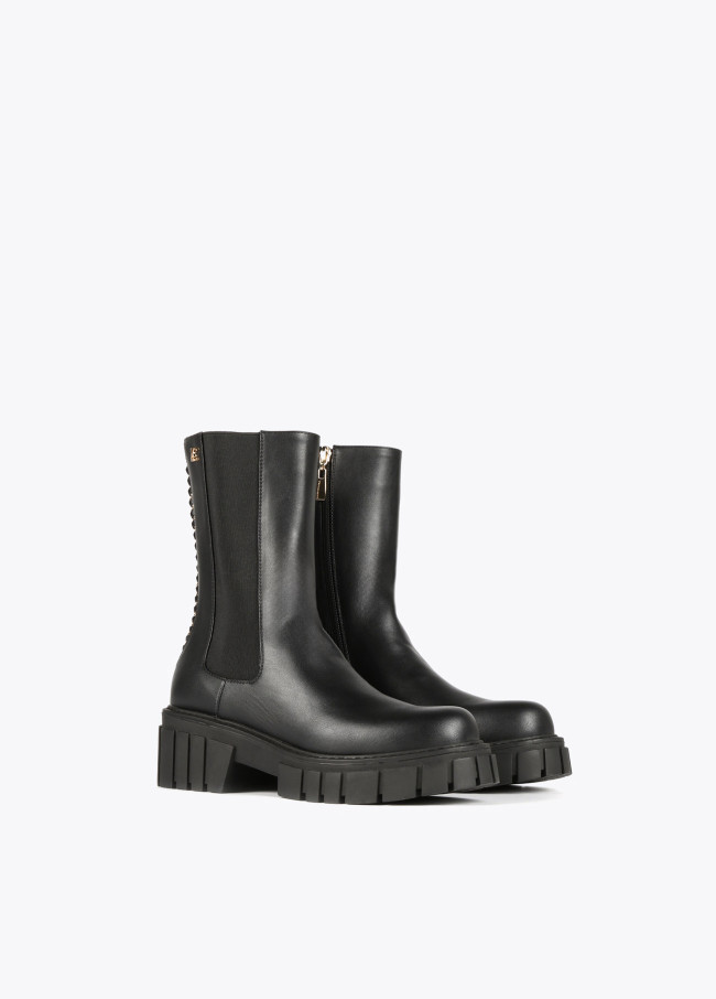 Bottines noires avec chaîne