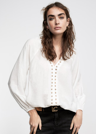 Blusa com pormenor de eyelets