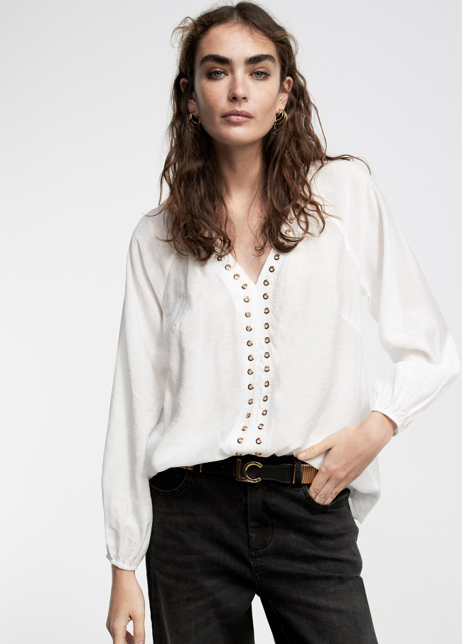 Blouse with eyelets