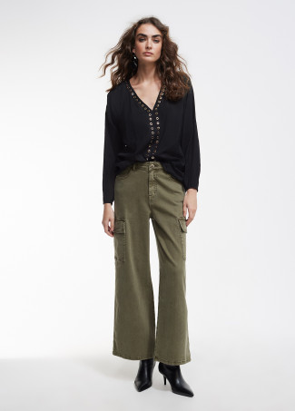 Blouse with eyelets