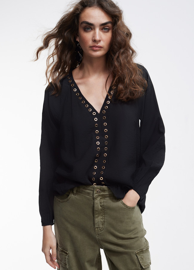 Blouse with eyelets