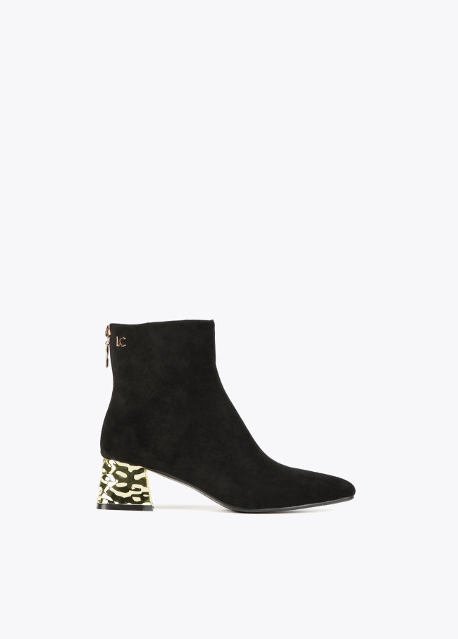 Ankle boots with golden heel