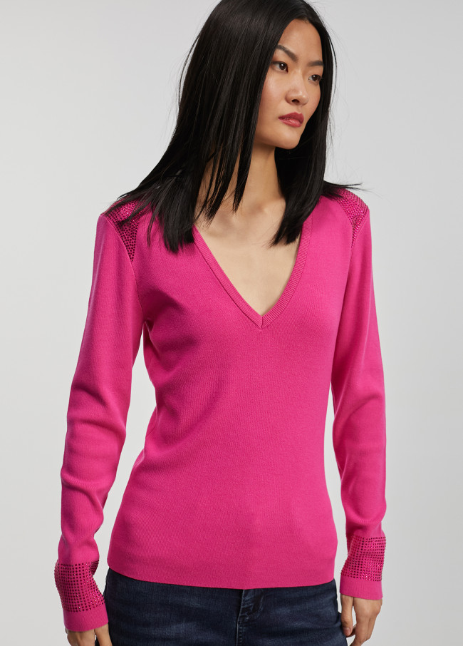 Knit sweater embellished with rhinestones