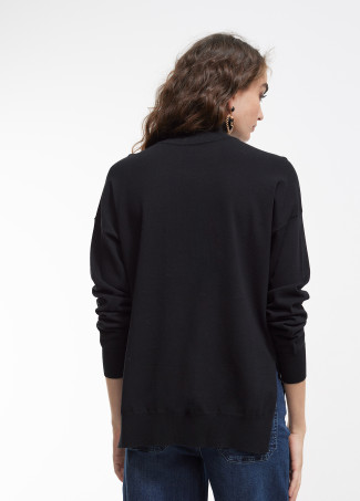 Knit sweater embellished with rhinestones