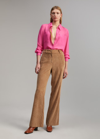 Camisa com transparência e bolsos