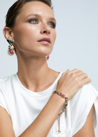 Golden bracelet with multiple stones