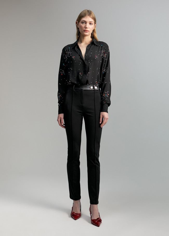 Faux leather detail trousers