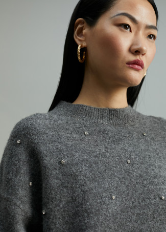 Sweater with crystal details