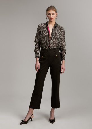 Trousers with button detail