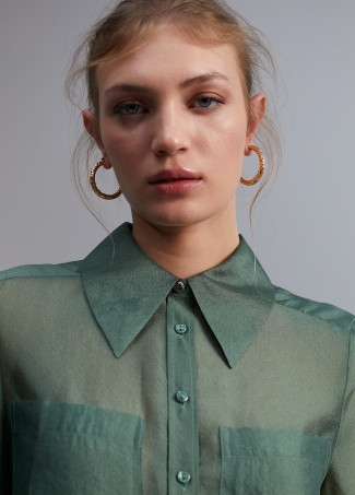 Sheer blouse with pockets