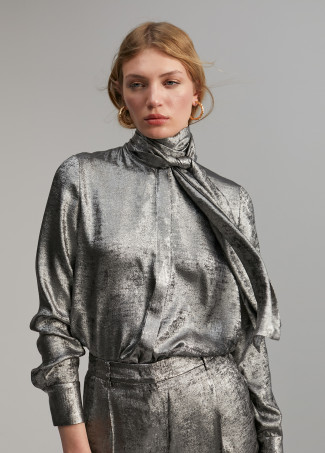 Laminated blouse with bow
