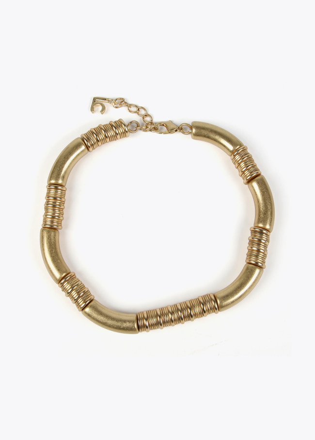 Necklace with gold-toned pieces