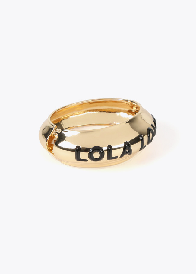 Gold-toned bracelet with slogan
