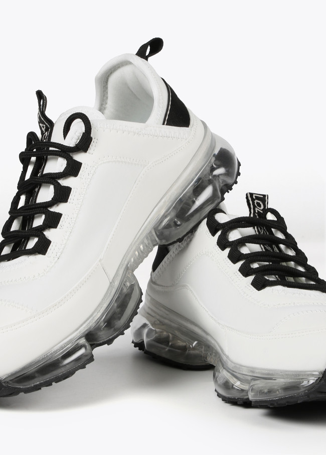 Two-tone trainers with transparent soles
