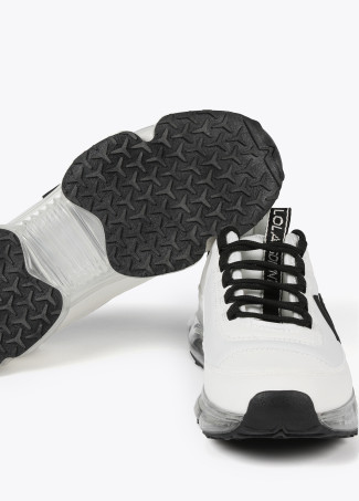 Zapatilla deportiva bicolor suela transparente