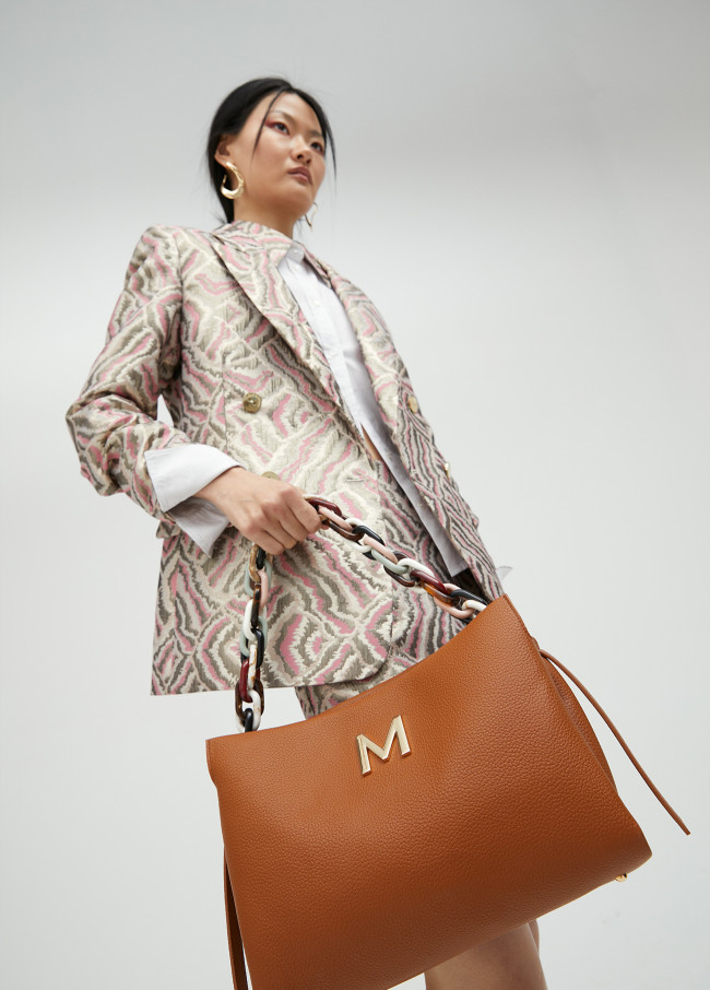 Large faux leather bag with multicoloured strap