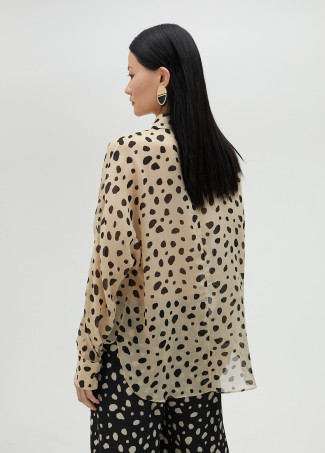 Chemise noire à pois