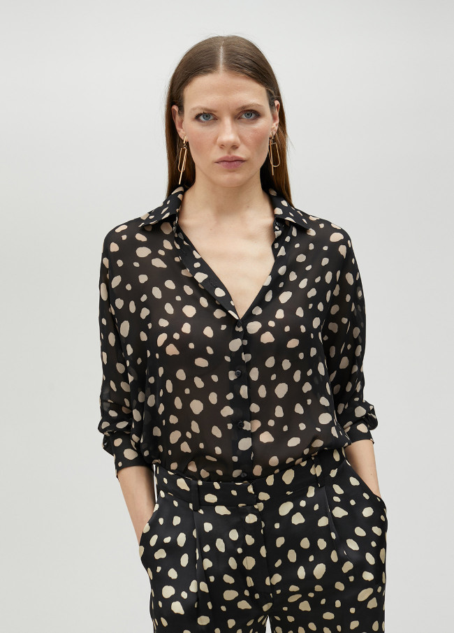 Chemise noire à pois