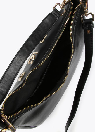 Shoulder bag with square metal eyelets