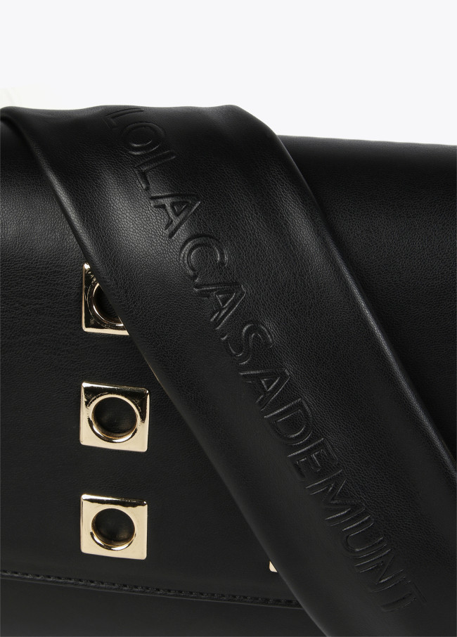 Crossbody bag with square metal eyelets