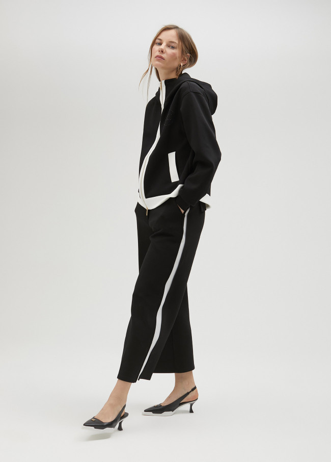 Black trousers with white side detail