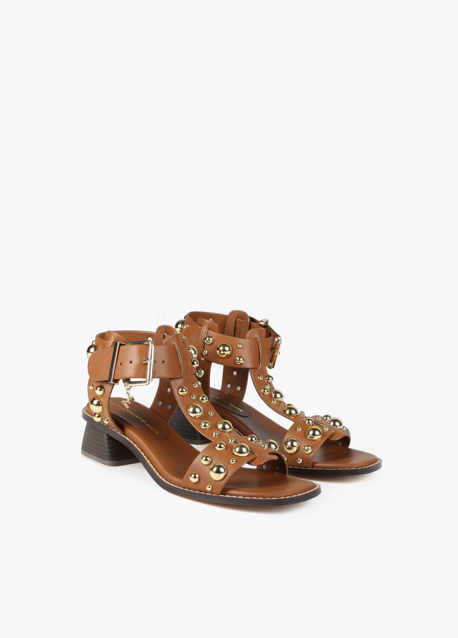 Heeled sandals with metallic embellishments