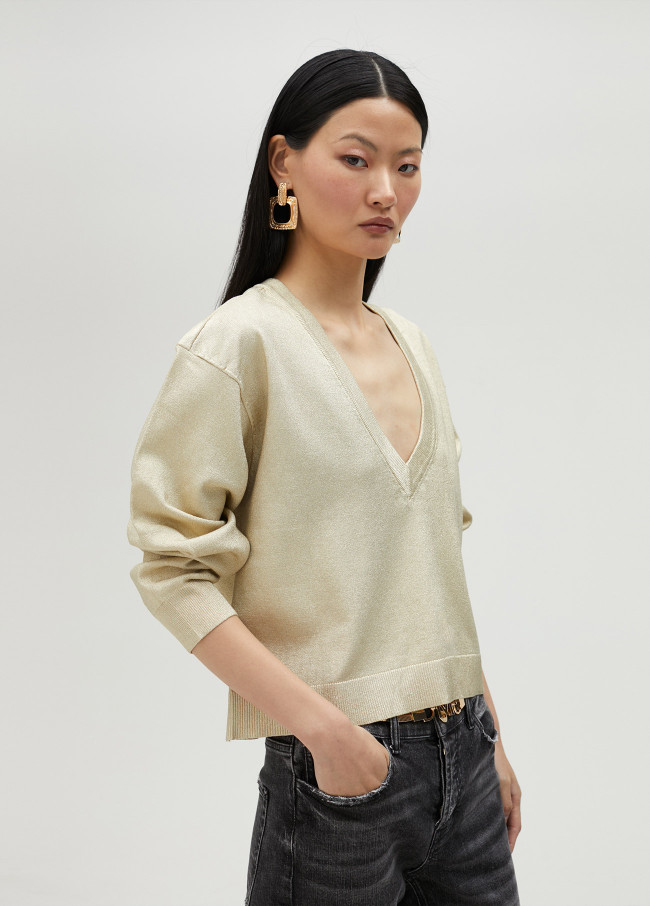 Gold V-neck sweater