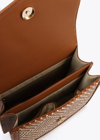 Borsa a tracolla intrecciata con patta