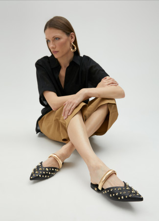 Mules with strap and metal embellishments