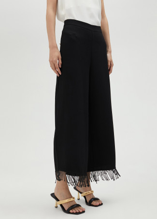Trousers with fringing and rhinestones