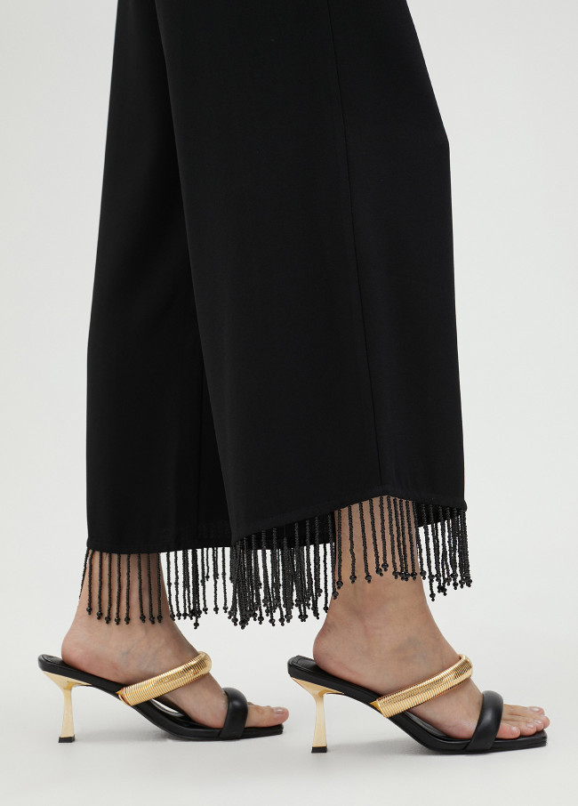 Pantalon à franges et strass