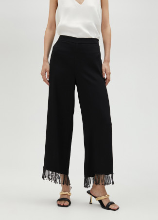 Pantalón con flecos y pedrería