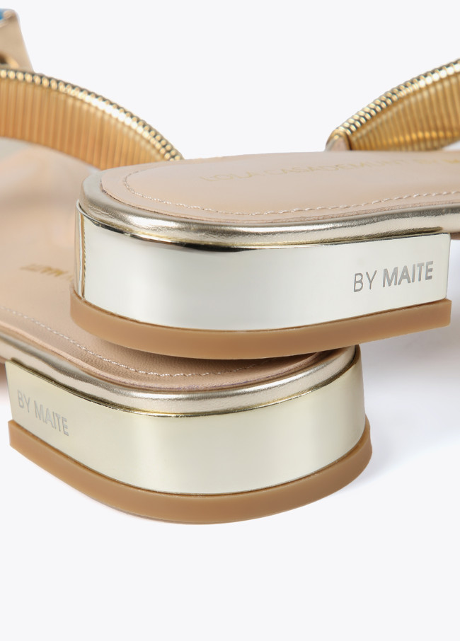 Metallic sandals with rhinestone ring detail