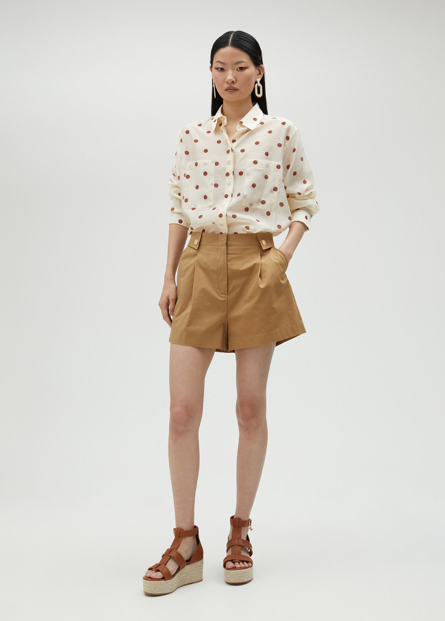 Camisa topos semitransparente