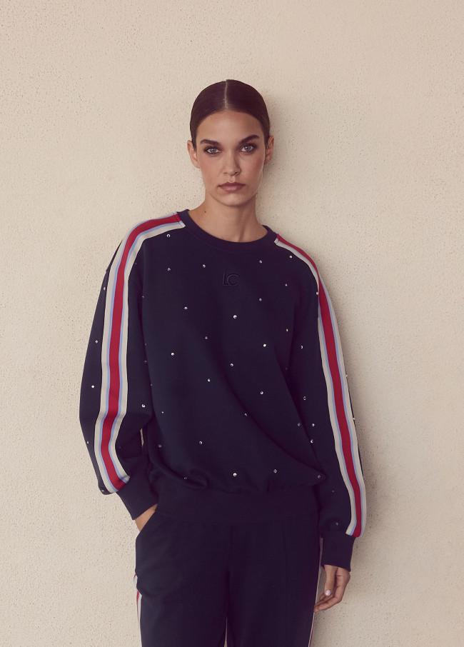Sweat avec bande de sport et strass